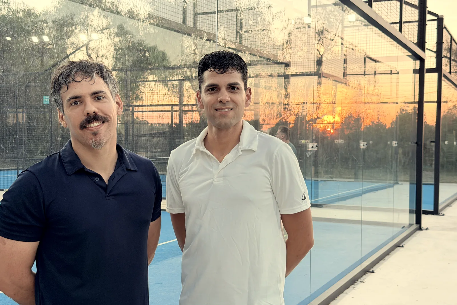 Two players at sunset